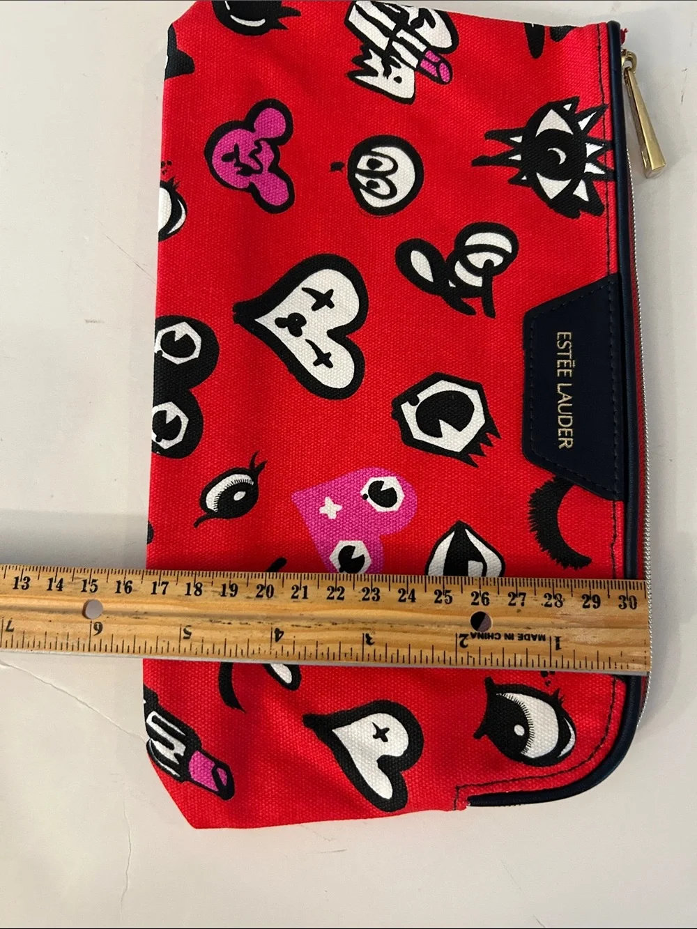 Estée Lauder Red Cosmetic Pouch with beasts, Mickey heads and cute graphics